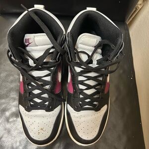 White black and purple Nike shoes